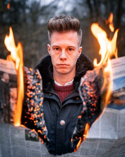 Brennende Zeitung fotografieren